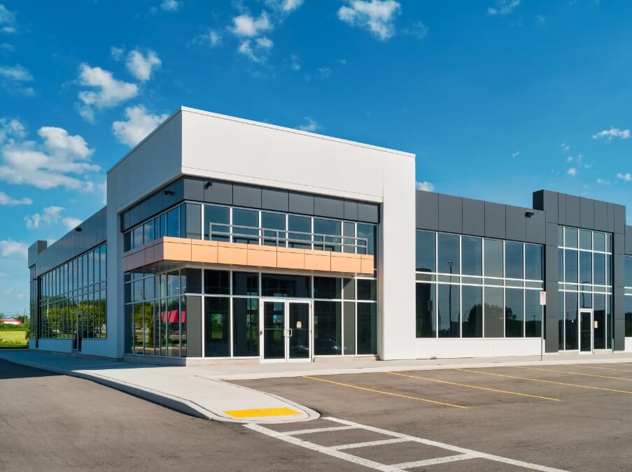 Exterior of office building with lots of glass windows