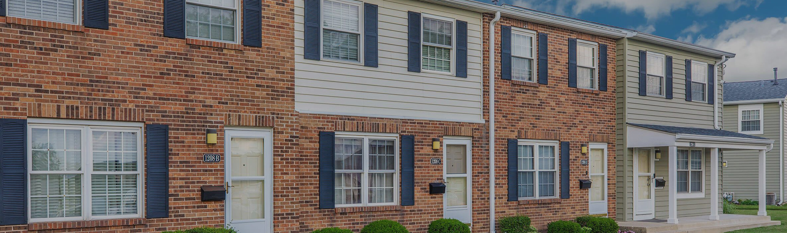 an exterior apartment with red brick