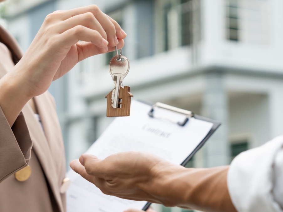 handing over keys to a building