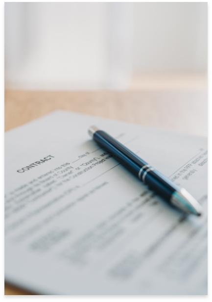 a pen resting on a printed document